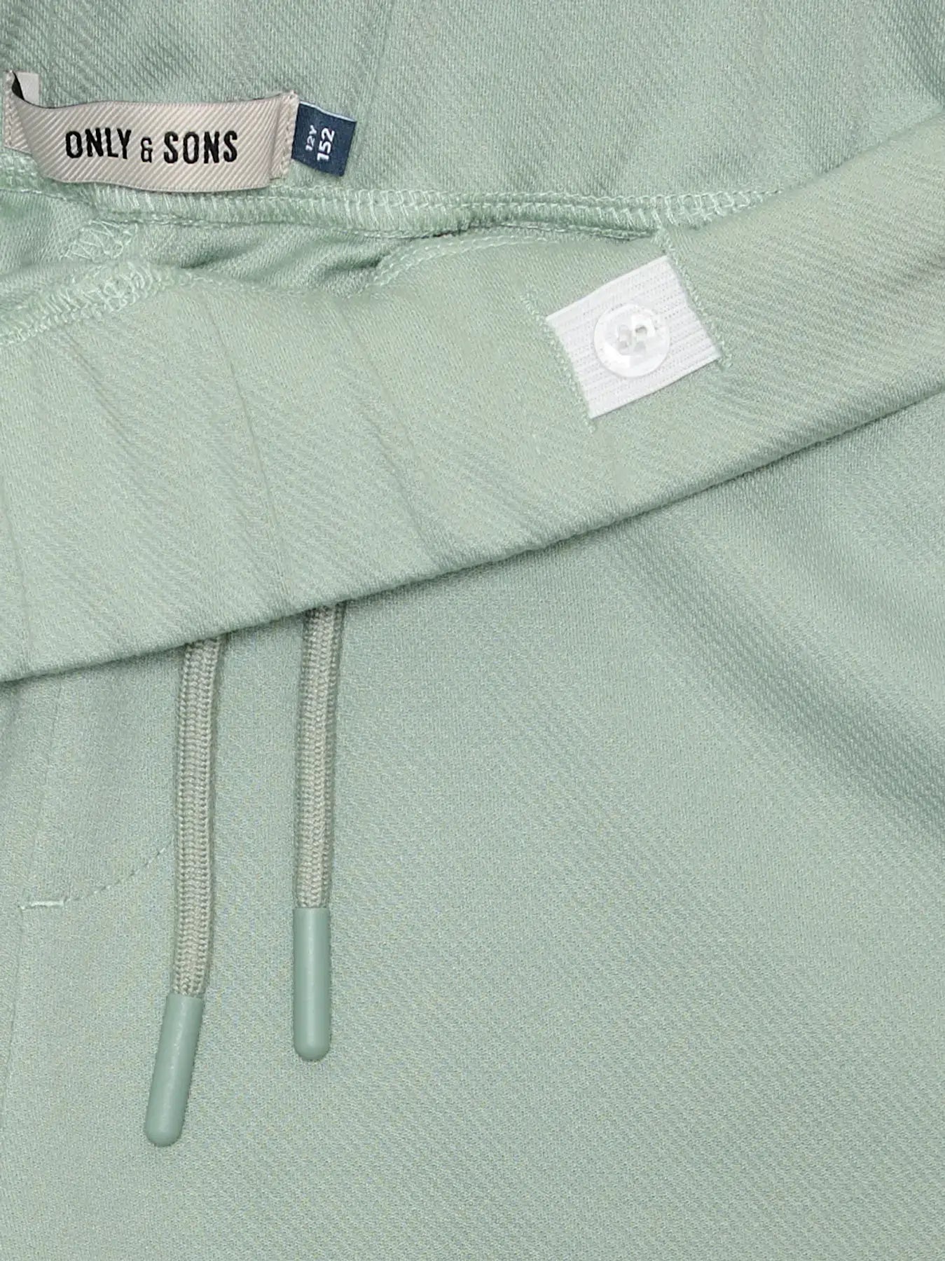 Close-up of Kids Only & Sons Jog Short NEWKODYL in Iceberg Green, highlighting the waistband and drawstrings.
