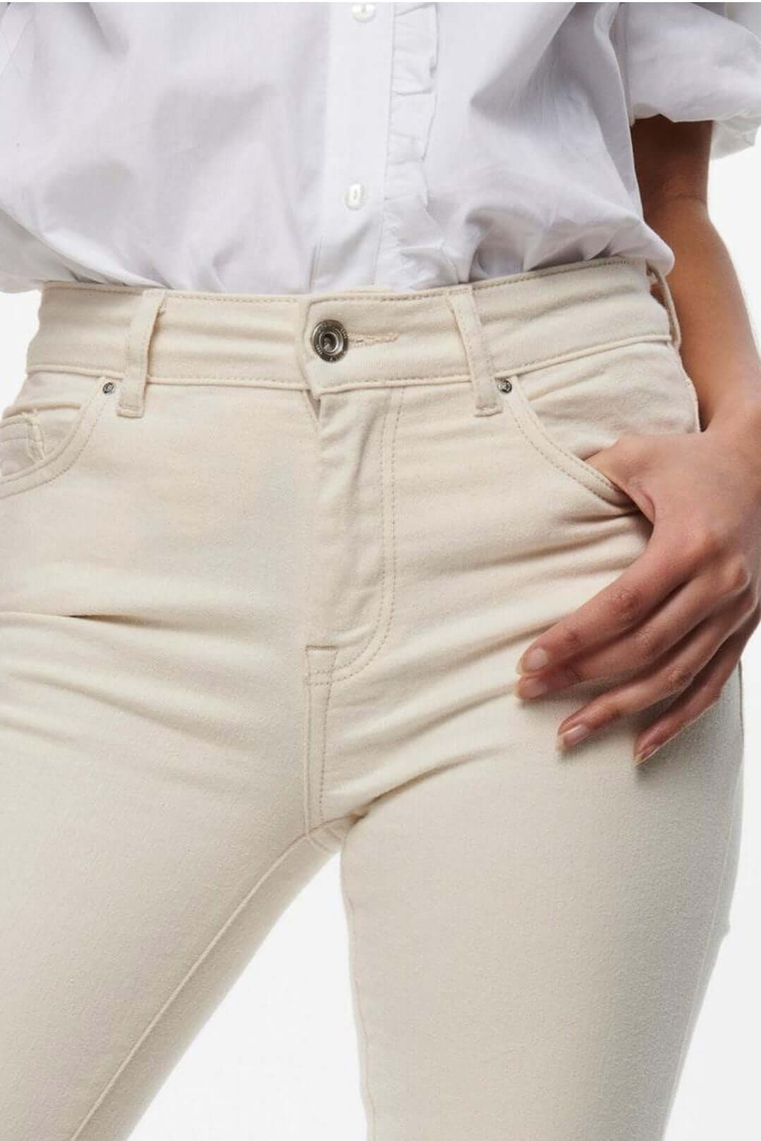Only Dames BLUSH Mid Flared Jeans in Ecru, featuring a high waist and slim fit design, perfect for contemporary fashion.