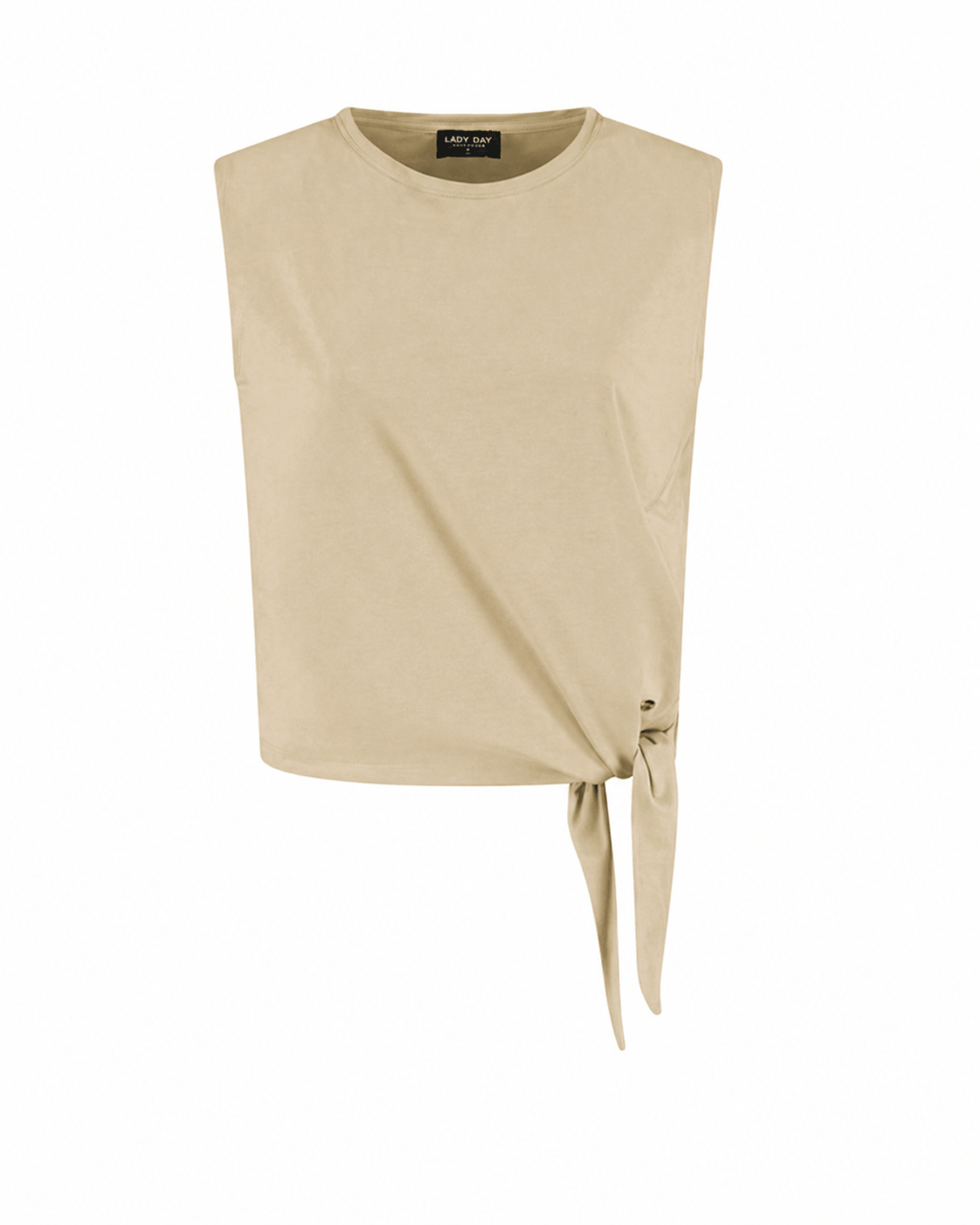Comfy travel top VIDA shell in een lichte zandkleur met een knoopdetail aan de zijkant.