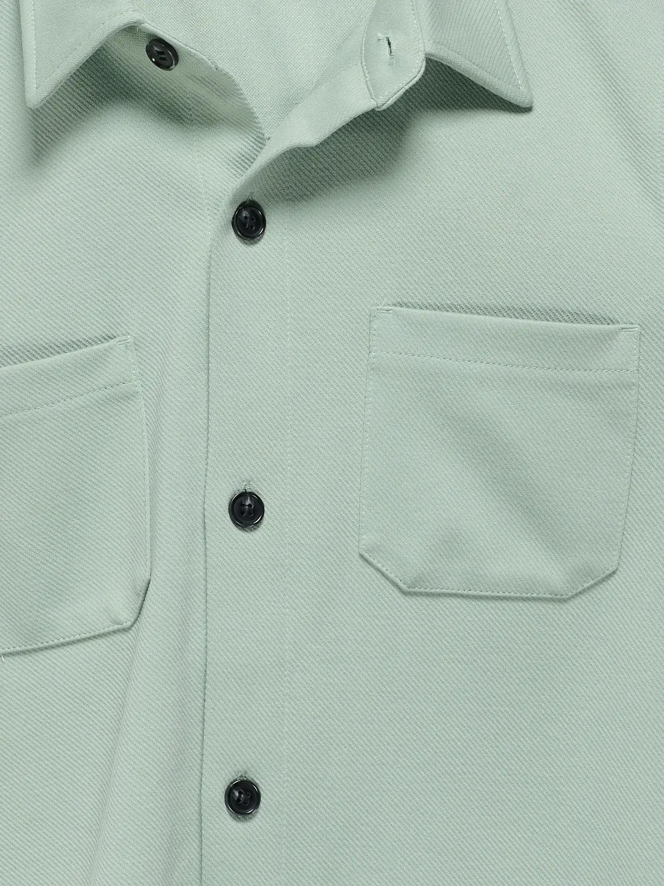 Kids Only & Sons NEWKODYL blouse in Iceberg Green featuring a button-up design and dual chest pockets.